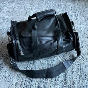 Vintage genuine black leather duffle bag